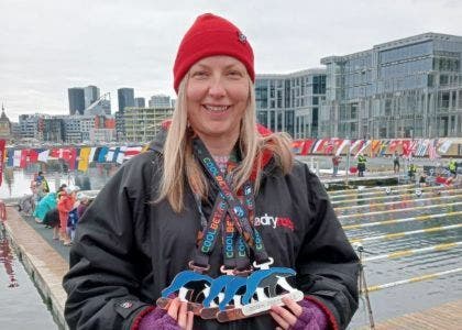 Wendy Bates dips her toe in the water of ice swimming